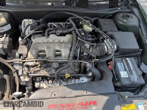 2001 Pontiac Grand Am GT z VIN 1G2NW12E81M522182, wystawiony jako Copart lot #68724715 z przebiegiem 74 661 mil mil oraz Czysty tytuł • Clean title. Historia ofert i sprzedaży dostępna na DreamBid. Obrazek 7.