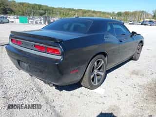 2014 Dodge Challenger R/T z VIN 2C3CDYBT8EH306376, wystawiony jako IAAI lot #43404926 z przebiegiem 197 718 mil mil oraz . Historia ofert i sprzedaży dostępna na DreamBid. Obrazek 4.