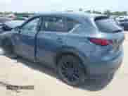 2022 Mazda CX-5 S Carbon Edition z VIN JM3KFBCM2N0571117, wystawiony jako IAAI lot #42535593 z przebiegiem 33 735 mil mil oraz . Historia ofert i sprzedaży dostępna na DreamBid. Obrazek 3.