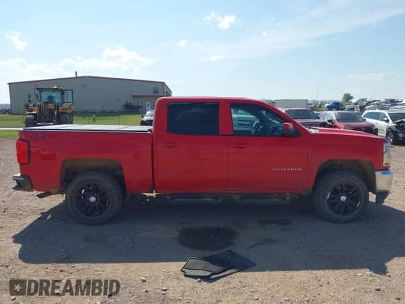 2018 Chevrolet Silverado 1500 LT with VIN 3GCUKREC7JG406986, listed as a IAAI auction lot 42928709 with 177,395 mi miles and . Bid and sale history available at DreamBid. Image 13.
