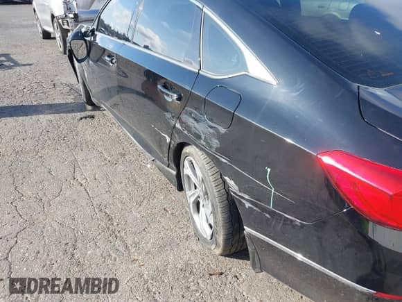 2018 Honda Accord EX-L with VIN 1HGCV2F69JA020881, listed as a IAAI auction lot 43213853 with 111,924 mi miles and . Bid and sale history available at DreamBid. Image 19.