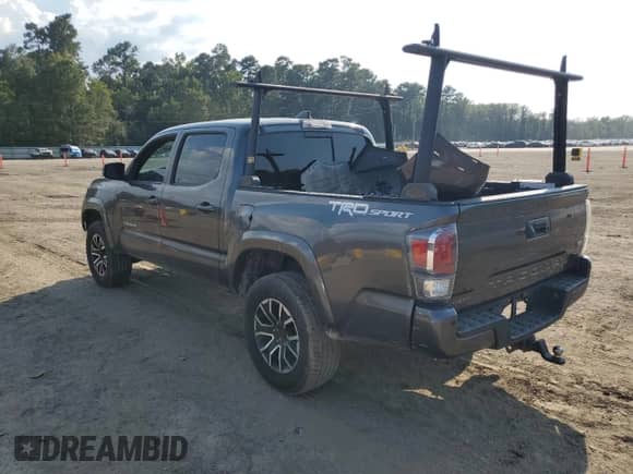 2020 Toyota Tacoma SR5 с VIN 3TMAZ5CN0LM118016, выставлен на аукционе Copart как лот 80166295 с пробегом 82 935 миль миль и Списание • Salvage title. История ставок и продаж доступна на DreamBid. Изображение 2.