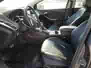 2014 Ford Focus Titanium с VIN 1FADP3N21EL204861, выставлен на аукционе Copart как лот 80388865 с пробегом 178 239 миль миль и Списание • Salvage title. История ставок и продаж доступна на DreamBid. Изображение 7.