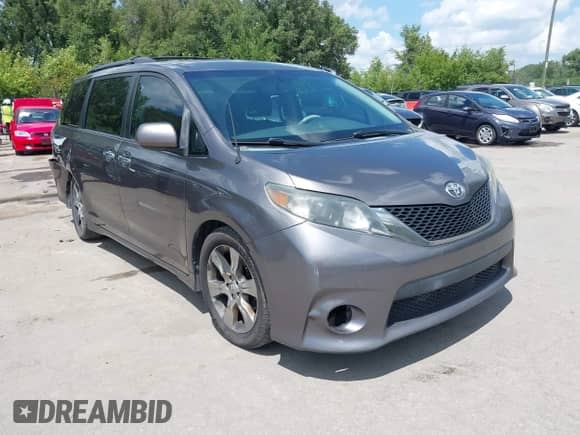 2014 Toyota Sienna SE with VIN 5TDXK3DC8ES443113, listed as a IAAI auction lot 42735795 with 235,269 mi miles and . Bid and sale history available at DreamBid. Image 1.