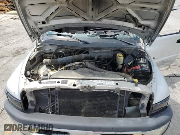 2001 Dodge 2500 с VIN 3B7KC23Z51G795842, выставлен на аукционе Copart как лот 68699305 с пробегом 173 961 миль миль и На запчасти • Non repairable. История ставок и продаж доступна на DreamBid. Изображение 11.