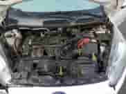 2015 Ford Fiesta SE z VIN 3FADP4BJ6FM136249, wystawiony jako Copart lot #90844195 z przebiegiem 133 405 mil mil oraz Szkoda całkowita • Salvage title. Historia ofert i sprzedaży dostępna na DreamBid. Obrazek 11.