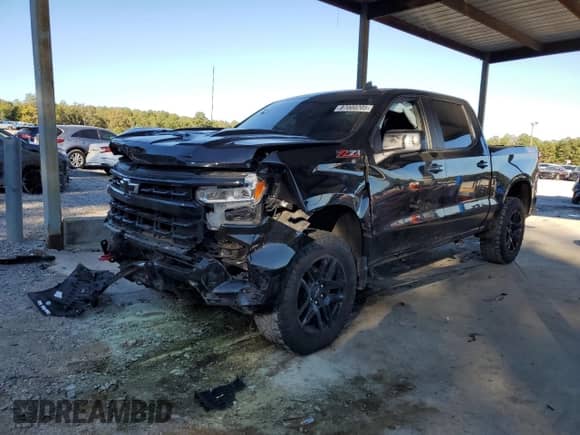 2023 Chevrolet Silverado 1500 LT Trail Boss with VIN 3GCUDFED1PG244640, listed as a Copart auction lot 87000205 with 52,000 mi miles and Salvage title. Bid and sale history available at DreamBid. Image 1.