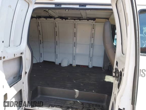 2020 Chevrolet Express Cargo with VIN 1GCWGBFP8L1120262, listed as a IAAI auction lot 42010679 with 114,589 mi miles and . Bid and sale history available at DreamBid. Image 8.