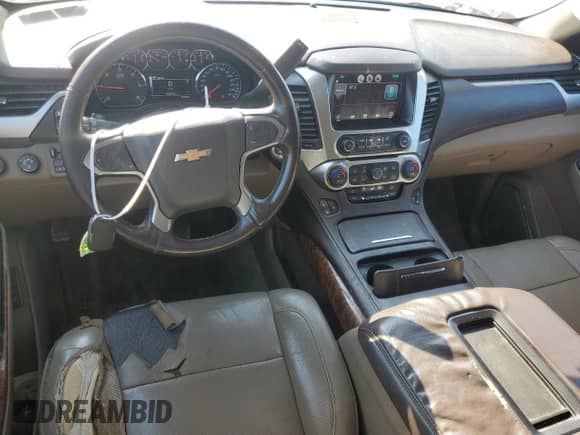 2015 Chevrolet Tahoe LTZ с VIN 1GNSKCKC5FR194824, выставлен на аукционе Copart как лот 71463875 с пробегом 169 679 миль миль и Списание • Salvage title. История ставок и продаж доступна на DreamBid. Изображение 8.