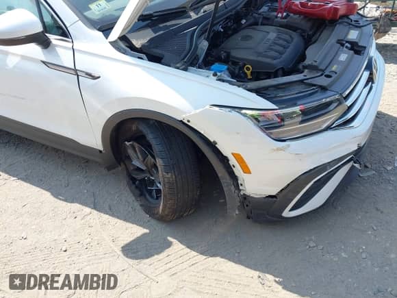 2023 Volkswagen Tiguan SE with VIN 3VVMB7AX2PM003264, listed as a IAAI auction lot 42924212 with 24,014 mi miles and . Bid and sale history available at DreamBid. Image 6.