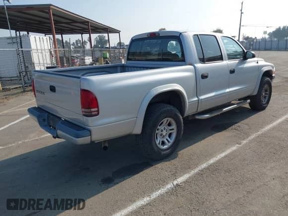 2004 Dodge Dakota Sport with VIN 1D7HG38K44S732251, listed as a IAAI auction lot 43536264 with 139,413 mi miles and . Bid and sale history available at DreamBid. Image 4.