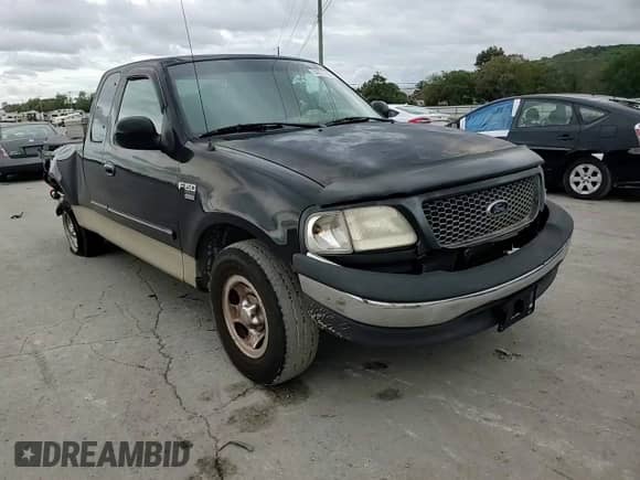 2000 Ford F-150 XL z VIN 1FTRX17L2YNA44461, wystawiony jako Copart lot #84027265 z przebiegiem Nie podano mil oraz Czysty tytuł • Clean title. Historia ofert i sprzedaży dostępna na DreamBid. Obrazek 13.