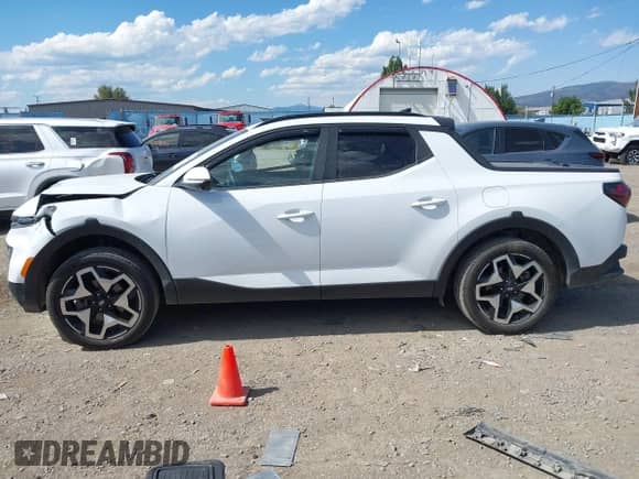 2022 Hyundai Santa Cruz Limited with VIN 5NTJEDAF4NH014611, listed as a IAAI auction lot 43029085 with 23,311 mi miles and . Bid and sale history available at DreamBid. Image 15.
