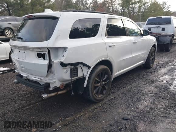 2019 Dodge Durango GT with VIN 1C4RDJDG5KC833738, listed as a IAAI auction lot 41570422 with 57,259 mi miles and . Bid and sale history available at DreamBid. Image 4.