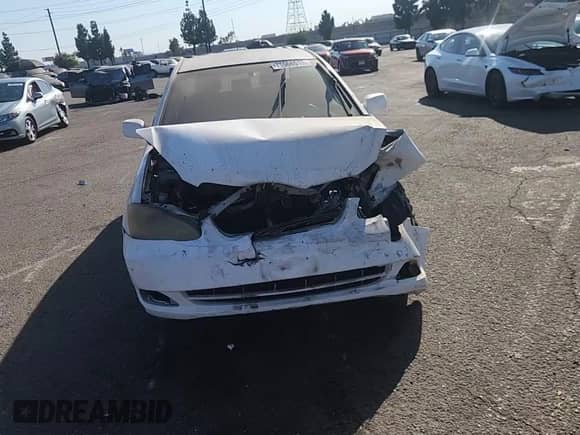 2005 Toyota Corolla CE с VIN 1NXBR32E55Z427999, выставлен на аукционе Copart как лот 71066515 с пробегом Не указан миль и Списание • Salvage title. История ставок и продаж доступна на DreamBid. Изображение 13.