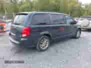 2014 Dodge Grand Caravan SXT with VIN 2C4RDGCG9ER245423, listed as a IAAI auction lot 43340034 with 228,584 mi miles and . Bid and sale history available at DreamBid. Image 4.