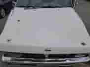 1996 Nissan Frontier XE with VIN 1N6SD16S6TC389626, listed as a Copart auction lot 59312595 with 210,292 mi miles and Salvage title. Bid and sale history available at DreamBid. Image 11.