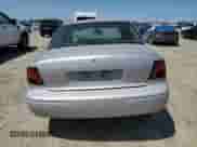2000 Saturn SL with VIN 1G8ZH5280YZ121421, listed as a Copart auction lot 58169285 with 226,014 mi miles and Salvage title. Bid and sale history available at DreamBid. Image 6.