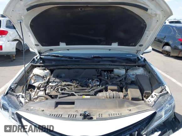 2022 Toyota Camry Hybrid LE with VIN 4T1C31AK8NU594181, listed as a IAAI auction lot 42666278 with 35,921 mi miles and . Bid and sale history available at DreamBid. Image 10.