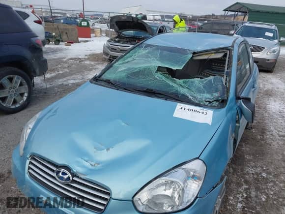 2010 Hyundai Accent Blue z VIN KMHCM3AC7AU175461, wystawiony jako IAAI lot #41408642 z przebiegiem 151 660 mil mil oraz . Historia ofert i sprzedaży dostępna na DreamBid. Obrazek 6.