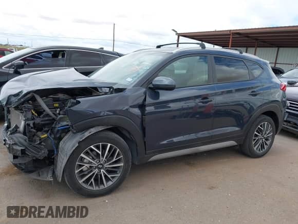 2021 Hyundai Tucson SEL with VIN KM8J33AL8MU345776, listed as a IAAI auction lot 42620741 with 25,733 mi miles and . Bid and sale history available at DreamBid. Image 14.