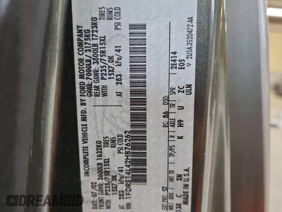 2002 Ford Econoline Cargo Recreational with VIN 1FDRE14L42HB76262, listed as a Copart auction lot 66448265 with 99,825 mi miles and Salvage title. Bid and sale history available at DreamBid. Image 13.