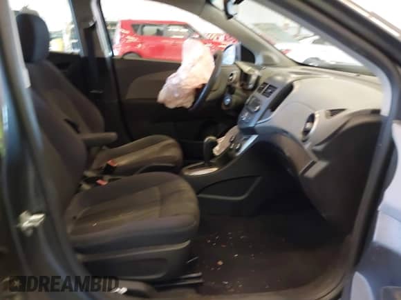 2012 Chevrolet Sonic LT with VIN 1G1JC5SB3C4168812, listed as a IAAI auction lot 42748632 with 130,949 mi miles and . Bid and sale history available at DreamBid. Image 5.