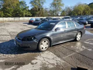 2012 Chevrolet Impala LT Retail with VIN 2G1WB5E35C1177648, listed as a Copart auction lot 85580065 with 122,454 mi miles and Salvage title. Bid and sale history available at DreamBid. Image 1.