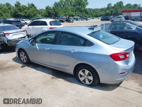 2018 Chevrolet Cruze LS with VIN 1G1BC5SM7J7172735, listed as a IAAI auction lot 42584080 with 91,015 mi miles and . Bid and sale history available at DreamBid. Image 14.