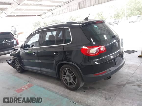 2011 Volkswagen Tiguan SE with VIN WVGAV7AX1BW549681, listed as a IAAI auction lot 40772939 with 157,547 mi miles and . Bid and sale history available at DreamBid. Image 14.