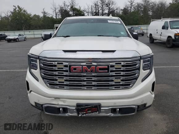 2023 GMC Sierra 1500 Denali z VIN 1GTUUGED8PZ115395, wystawiony jako Copart lot #71721435 z przebiegiem 46 201 mil mil oraz Szkoda całkowita • Salvage title. Historia ofert i sprzedaży dostępna na DreamBid. Obrazek 5.