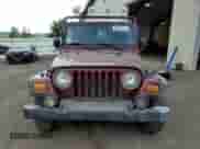 2004 Jeep Wrangler Sport z VIN 1J4FA49S94P714137, wystawiony jako Copart lot #80966325 z przebiegiem 142 534 mil mil oraz Czysty tytuł • Clean title. Historia ofert i sprzedaży dostępna na DreamBid. Obrazek 5.