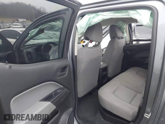 2021 Chevrolet Colorado 4WD Work Truck z VIN 1GCGTBEN9M1296691, wystawiony jako IAAI lot #41460241 z przebiegiem 55 952 mil mil oraz . Historia ofert i sprzedaży dostępna na DreamBid. Obrazek 8.