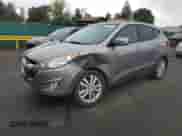 2011 Hyundai Tucson Limited with VIN KM8JUCAC0BU226646, listed as a Copart auction lot 80653715 with 105,174 mi miles and Salvage title. Bid and sale history available at DreamBid. Image 1.