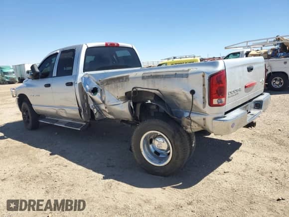 2004 Dodge 3500 SLT with VIN 3D7MU48614G158487, listed as a Copart auction lot 69199324 with 122,891 mi miles and Salvage title. Bid and sale history available at DreamBid. Image 2.