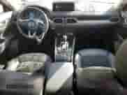 2023 Mazda CX-5 S Select z VIN JM3KFBBM8P0283297, wystawiony jako Copart lot #80301095 z przebiegiem 20 771 mil mil oraz Szkoda całkowita • Salvage title. Historia ofert i sprzedaży dostępna na DreamBid. Obrazek 8.