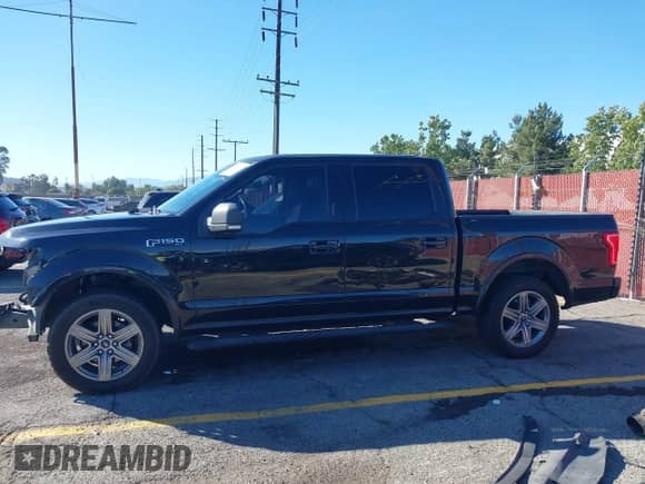2015 Ford F-150 XL with VIN 1FTEW1CF8FKD36874, listed as a IAAI auction lot 43469039 with 153,011 mi miles and . Bid and sale history available at DreamBid. Image 15.
