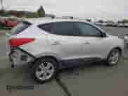 2012 Hyundai Tucson GLS with VIN KM8JU3AC2CU489478, listed as a Copart auction lot 71709285 with 121,070 mi miles and Salvage title. Bid and sale history available at DreamBid. Image 3.