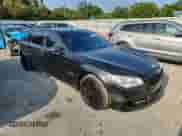 2013 BMW 7 Series 750Li с VIN WBAYE8C51DDE22061, выставлен на аукционе Copart как лот 63578755 с пробегом 137 192 миль миль и Списание • Salvage title. История ставок и продаж доступна на DreamBid. Изображение 4.