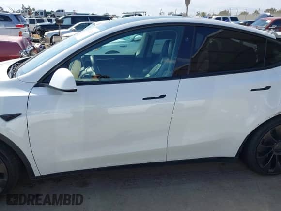 2023 Tesla Model Y Performance with VIN 7SAYGDEF6PF807723, listed as a IAAI auction lot 43209294 with 48,943 mi miles and . Bid and sale history available at DreamBid. Image 15.