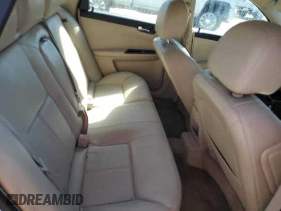 2011 Chevrolet Impala LTZ z VIN 2G1WC5EM1B1190028, wystawiony jako Copart lot #70317565 z przebiegiem Nie podano mil oraz Szkoda całkowita • Salvage title. Historia ofert i sprzedaży dostępna na DreamBid. Obrazek 10.