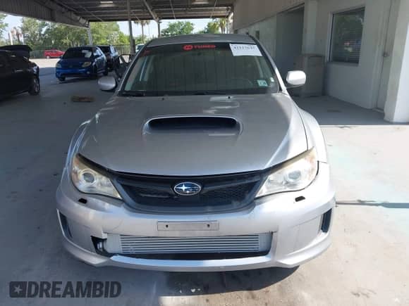 2013 Subaru WRX WRX with VIN JF1GV7E60DG014909, listed as a IAAI auction lot 42127645 with 70,360 mi miles and . Bid and sale history available at DreamBid. Image 12.