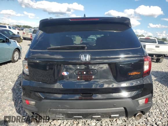 2024 Honda Passport TrailSport with VIN 5FNYF8H66RB016565, listed as a Copart auction lot 86606005 with Not provided miles and Clean title. Bid and sale history available at DreamBid. Image 6.