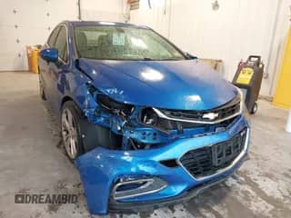 2017 Chevrolet Cruze Premier z VIN 1G1BF5SM3H7118351, wystawiony jako IAAI lot #43378142 z przebiegiem 64 471 mil mil oraz . Historia ofert i sprzedaży dostępna na DreamBid. Obrazek 1.