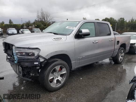 2020 Ram 1500 Laramie with VIN 1C6SRFJM7LN355667, listed as a Copart auction lot 45062385 with 121,512 mi miles and Salvage title. Bid and sale history available at DreamBid. Image 1.