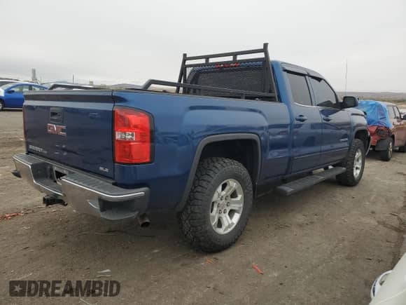 2019 GMC Sierra 1500 SLE with VIN 2GTV2MEC8K1209200, listed as a Copart auction lot 79260914 with 120,568 mi miles and Salvage title. Bid and sale history available at DreamBid. Image 3.