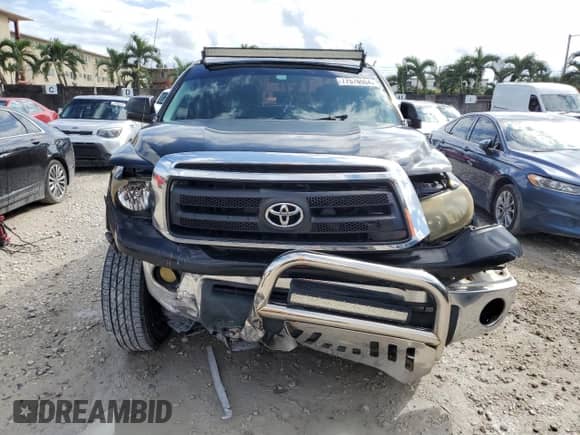 2012 Toyota Tundra z VIN 5TFRU5F13CX026371, wystawiony jako Copart lot #77576564 z przebiegiem 112 512 mil mil oraz Szkoda całkowita • Salvage title. Historia ofert i sprzedaży dostępna na DreamBid. Obrazek 5.