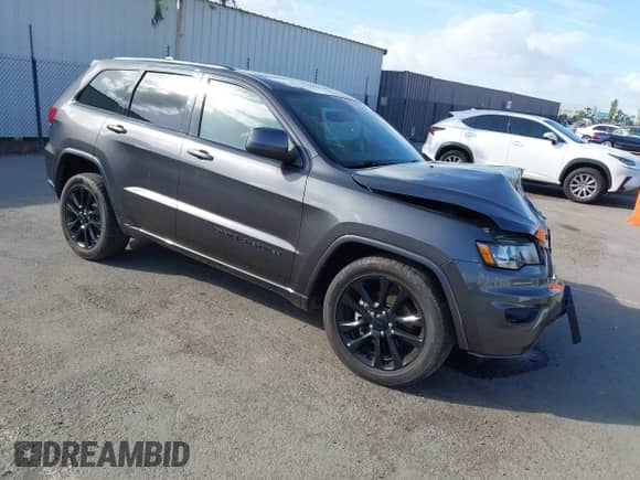 2018 Jeep Grand Cherokee Laredo E with VIN 1C4RJEAG9JC125219, listed as a IAAI auction lot 43438483 with 103,670 mi miles and . Bid and sale history available at DreamBid. Image 1.