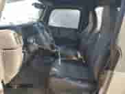 2000 Jeep Wrangler SE with VIN 1J4FA29P4YP775935, listed as a Copart auction lot 80458955 with 100,211 mi miles and Salvage title. Bid and sale history available at DreamBid. Image 7.