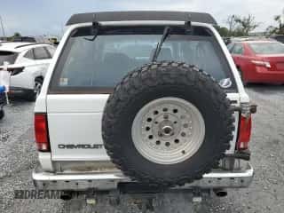 1991 Chevrolet Blazer z VIN 1GNCT18Z5M8105497, wystawiony jako Copart lot #65277335 z przebiegiem 156 219 mil mil oraz Szkoda całkowita • Salvage title. Historia ofert i sprzedaży dostępna na DreamBid. Obrazek 6.